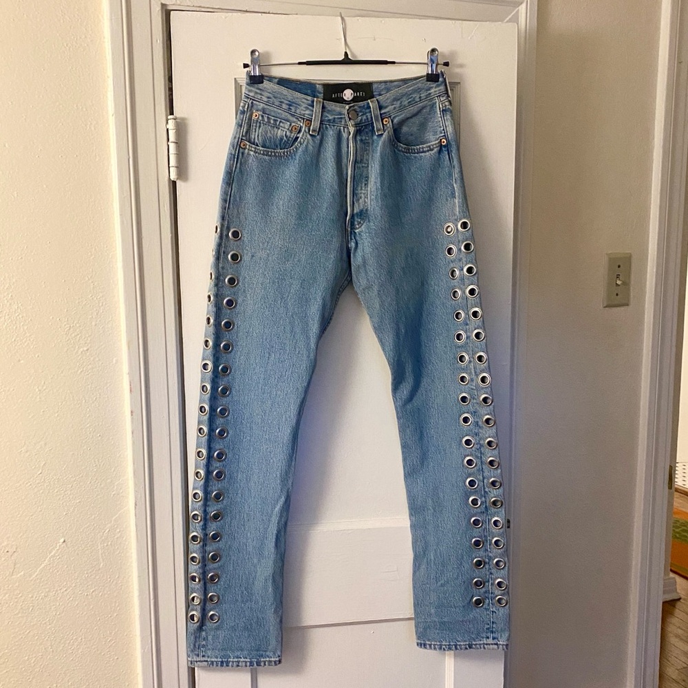 Reworked vintage Levi’s with grommet detailing